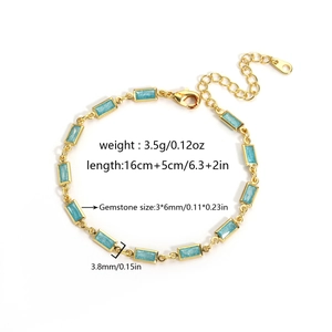 Vue détaillée du bracelet doré avec pierres bleues et dimensions affichées sur l'image