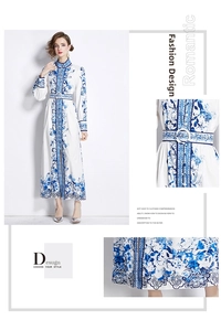 Detail of blue floral print, stand collar and buttons on an elegant long maxi dress