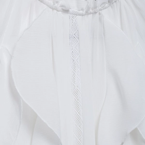 Elegant white chiffon blouse with ruffle trim, lace patchwork, and pleated stand collar