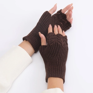 Detailed view of brown knit fingerless gloves with elegant cable stitch texture