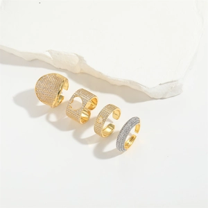Layered heart-shaped hollow rings set in gold-plated alloy with zircon accents