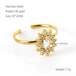 Detail of sunflower ring showing 18k gold plated steel and zircon stone specs