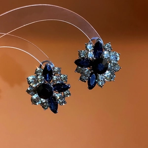 Exquisite silver flower earrings with deep blue marquise-cut stones and white zircon crystals