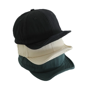 Kids quick-dry short brim baseball caps in black, beige, and dark green colors