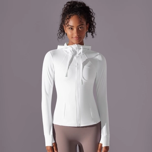 Detailed view of white hooded sports jacket with zipper and functional thumbhole cuffs
