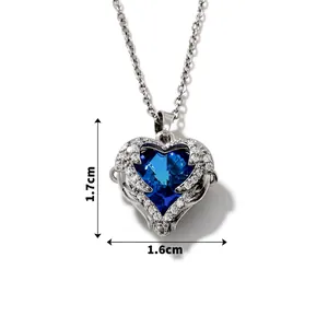 Detailed size view of silver heart necklace featuring a 1.7cm deep blue zircon pendant