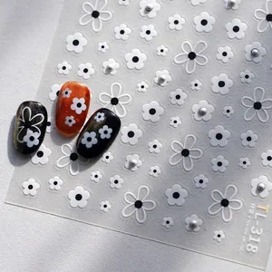 Floral nail art stickers with white flowers and 3D pearls for elegant manicure designs