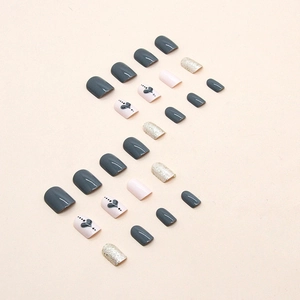 Short square navy blue and pink press-on nails with glitter and heart patterns