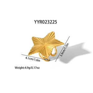 Detailed view of golden star ring with sunburst texture and size specifications