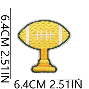 Detail of yellow embroidered football trophy patch showing dimensions 6.4cm by 2.51in