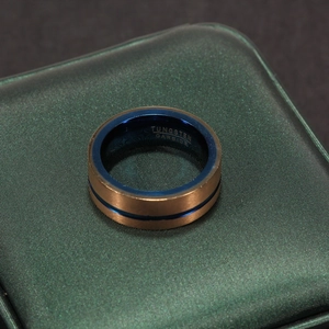 Close-up of dual-tone tungsten carbide ring with blue plated interior and matte exterior