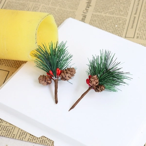 Artificial pine needles with mini pine cones and red berries for Christmas decoration