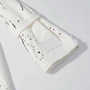 Women V-neck blazer with shoulder pads and black graffiti print on white twill fabric