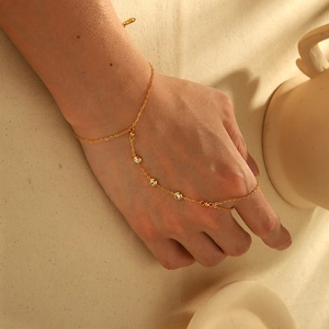 18K gold-plated stainless steel hand chain bracelet with three round zircon stones