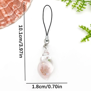 Pink resin seashell phone charm with crystal flower detail and dimensions 10.1cm by 1.8cm