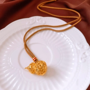 Exquisite 24k gold-plated hollow gourd pendant necklace with traditional filigree texture