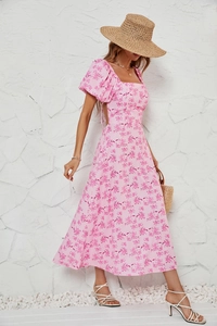 Close-up of pink floral dress featuring square neck, puff sleeves, and back tie-up detail