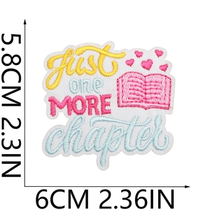 Detail showing 5.8x6cm embroidered book patch with Just one MORE chapter text