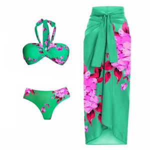 Detailed view of 3-piece floral bikini set including halter top and matching sarong