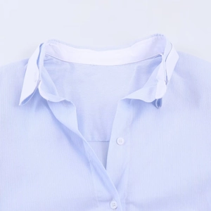 Women's light blue pinstripe shirt featuring a white contrast collar and button-up front