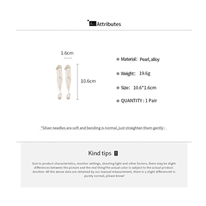Detail showing fishbone drop earrings with pearls and 10.6cm length dimensions