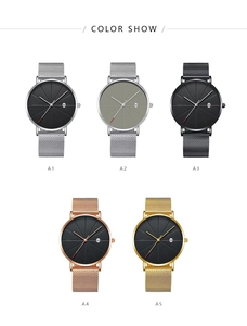 Detail view of five mesh band quartz watches with calendar dials and sunray patterns
