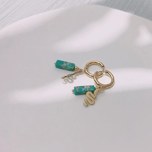 French vintage snake-shaped earrings with natural turquoise in gold finish