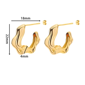 Detailed view of chunky gold irregular wave hoop earrings with dimensions 22mm x 18mm