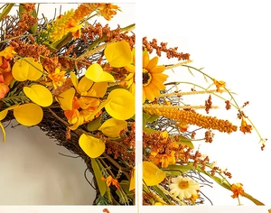 Détail de la couronne de tournesols artificiels avec feuilles d'eucalyptus et baies