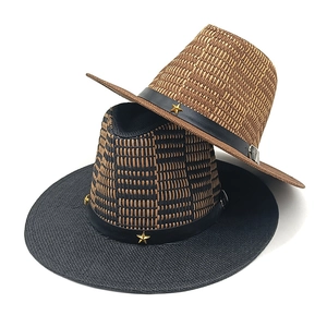 Handwoven Panama straw hats for men and women featuring a golden star metallic rivet
