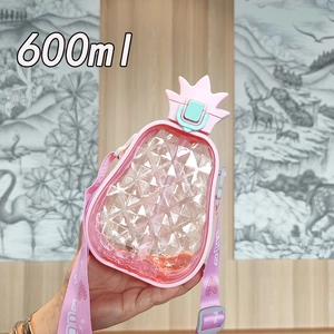 Close-up of 600ml pink pineapple straw bottle with heart pattern strap and clear body