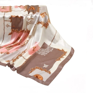 Silk-like square scarf with baroque chain and key patterns in pink and gold tones