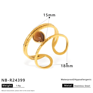 Macro detail of tiger eye ring dimensions showing 1.6g weight and 18mm inner diameter