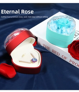 Detail view of heart-shaped preserved rose jewelry gift box with velvet interior