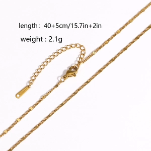 Detail of 18k gold plated box chain showing 40+5cm length and 2.1g weight specs