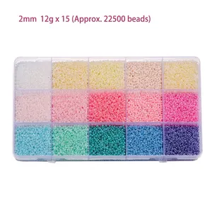 Detail of 2mm glass seed bead set with 15 macaron colors in a transparent storage box