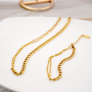 Layered gold titanium steel necklace with cuban chain and sequin detail for women
