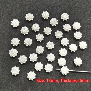 Detailed view of 13mm white flower resin bead accessory for DIY jewelry making