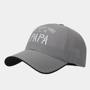 Detail of grey mesh baseball cap with laser-perforated vents and PAPA graphic print