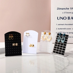 L-shaped acrylic earring holder with 72 holes in black white and clear options