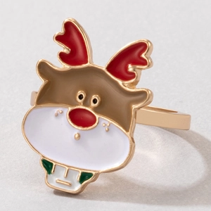 Macro view of Christmas reindeer napkin ring with colorful enamel finish on alloy metal