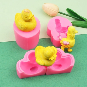 Macro detail of pink silicone molds for DIY 3D duck-shaped soaps and chocolate crafts