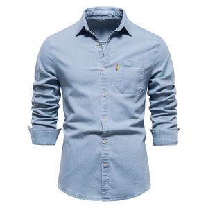 Classic men's light blue long sleeve denim shirt with turn-down collar and single pocket