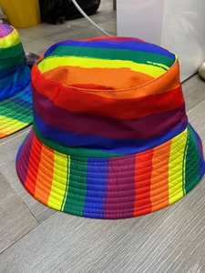 Detail of colorful rainbow striped canvas bucket hat with high saturation multi-color tones