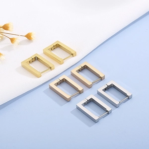 Three minimalist rectangular hoop earrings in gold, rose gold, and silver finishes