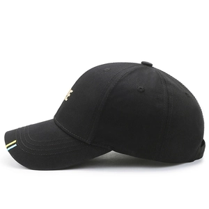 Black cotton baseball cap with gold letter E embroidery and striped brim detail