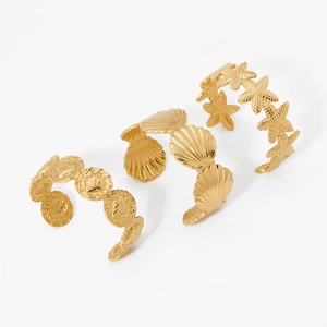 Gold stainless steel ocean-themed cuff bangle set with starfish and shell charms