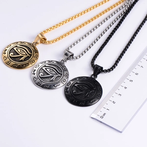 Size measurement of Eye of Horus pendants in gold, silver, and black stainless steel