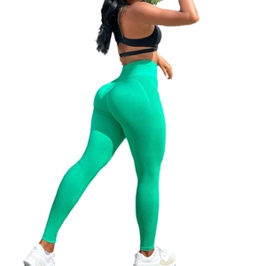 Bright green seamless high-waisted yoga pants with butt-lifting texture on white background
