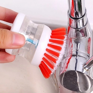 Spherical dish brush with automatic liquid dispenser and red bristles for kitchen cleaning